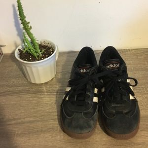 Black indoor soccer shoes